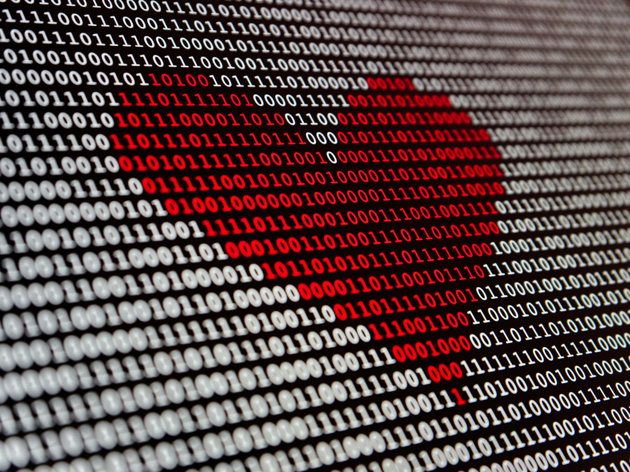 Red heart made out of binary digits illustrating the launch of Nova-3 Medical by Deepgram, an AI speech-to-text (STT) model tailored for transcription in the demanding environment of the healthcare sector.