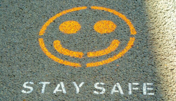 Stay safe written on the floor as Anthropic has detailed its safety strategy to try and keep its popular AI model, Claude, helpful while avoiding perpetuating harms.