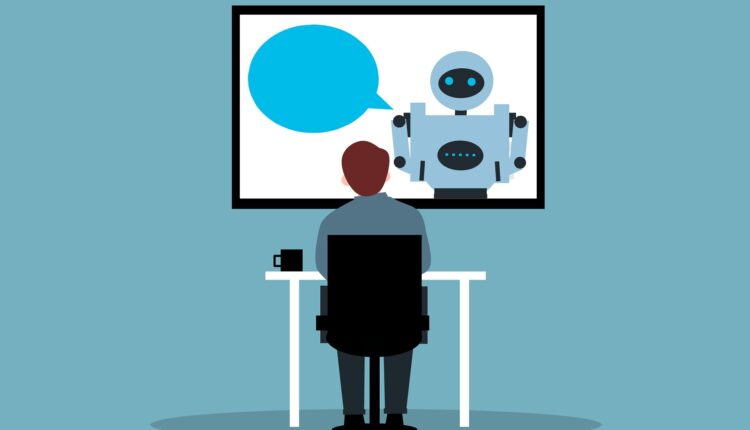 Employee chatting to a chatbot as new adoption data from Perplexity reveals how AI agents are driving workflow efficiency gains by taking over complex enterprise tasks.